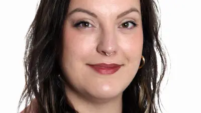 Professional portrait of USI professional studies student Ashley David