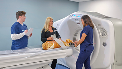 Students using CT simulator
