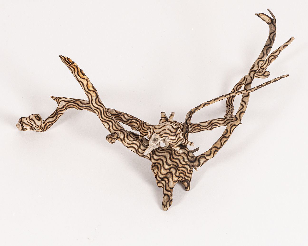 tattooed wood art piece