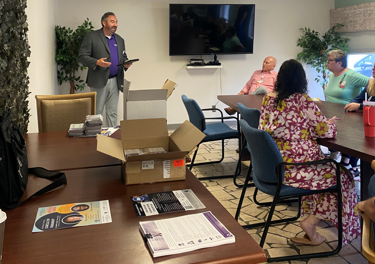 National Alzheimer's Association representative presenting at partner nursing home