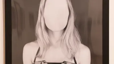 Artwork titled "Selfie" - image of a woman with a blank face