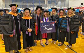 Graduate nursing faculty and students at graduation