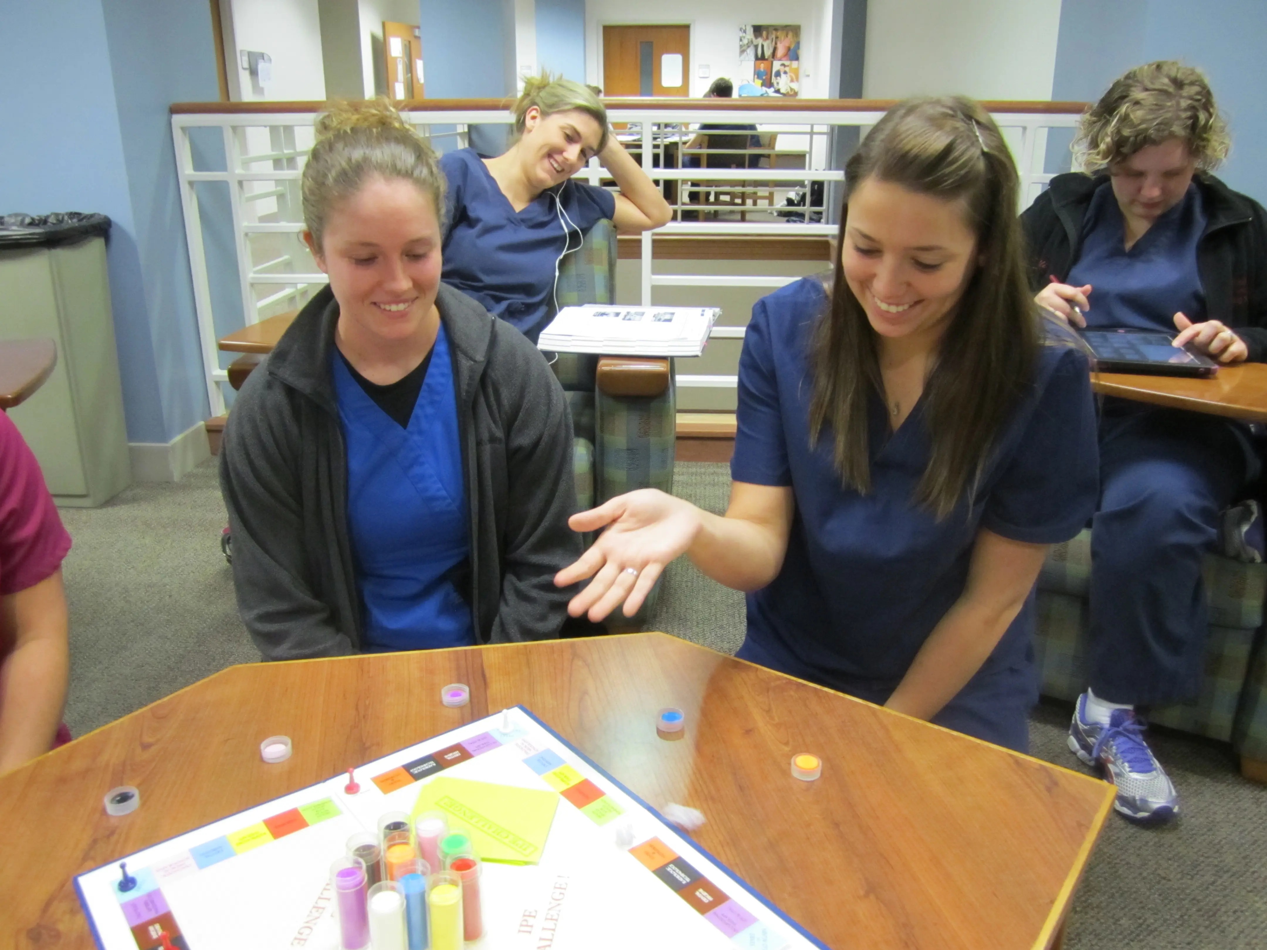 OTA students playing a board game