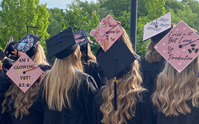 Decorated graduation caps for radiology students at commencement