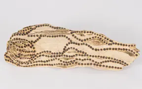 tattooed wood art piece