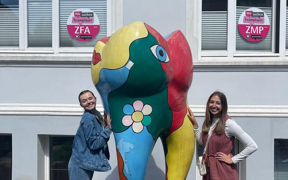 Students standing in front of a dental office