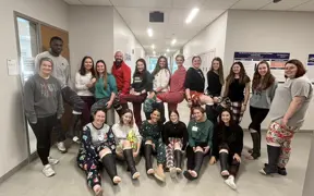 OTA students dressed in holiday attire