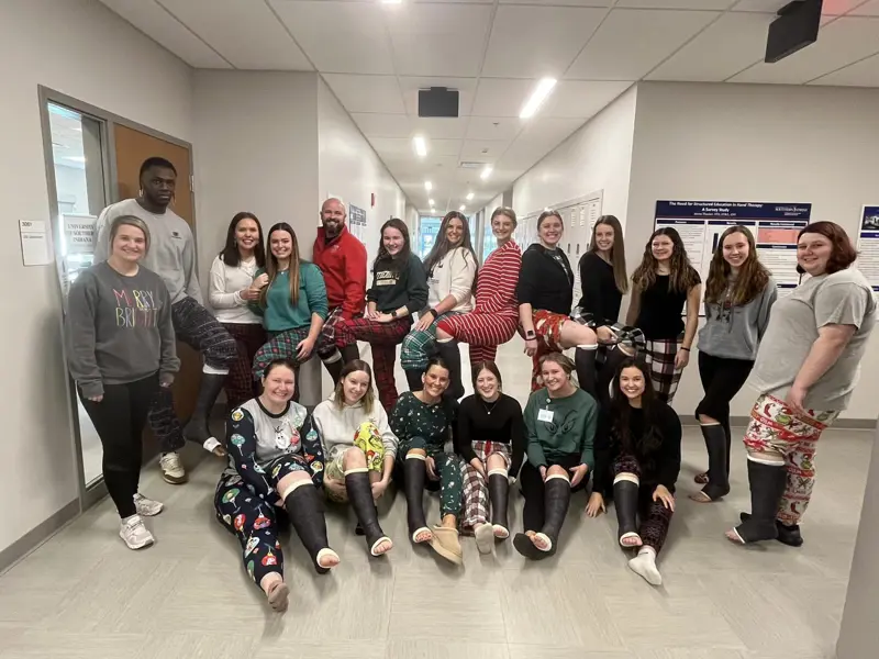 OTA students dressed in holiday attire