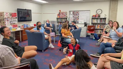 USI student journalists hold a meeting in The Shield on-campus newsroom