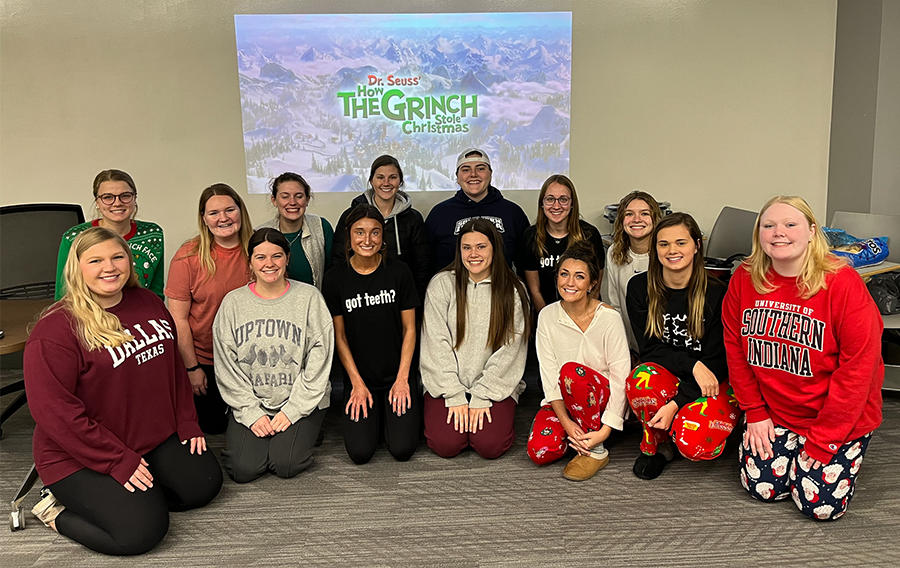 Dental hygiene students watch movie for holiday event