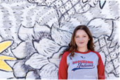 Casual portrait of USI psychology graduate RaAnna Tucker