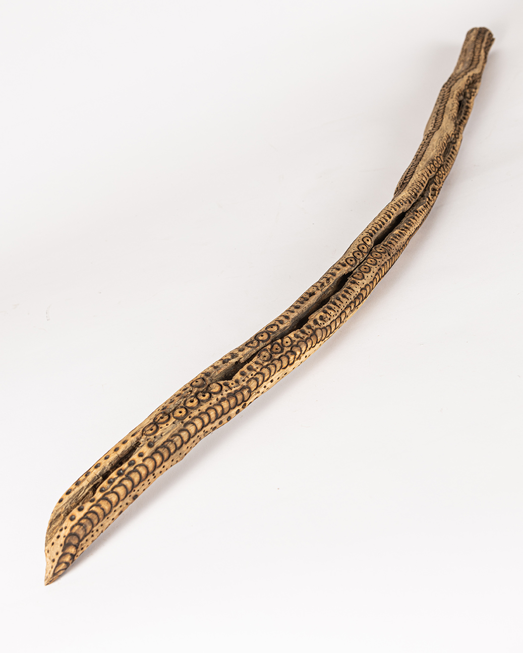 tattooed wood art piece