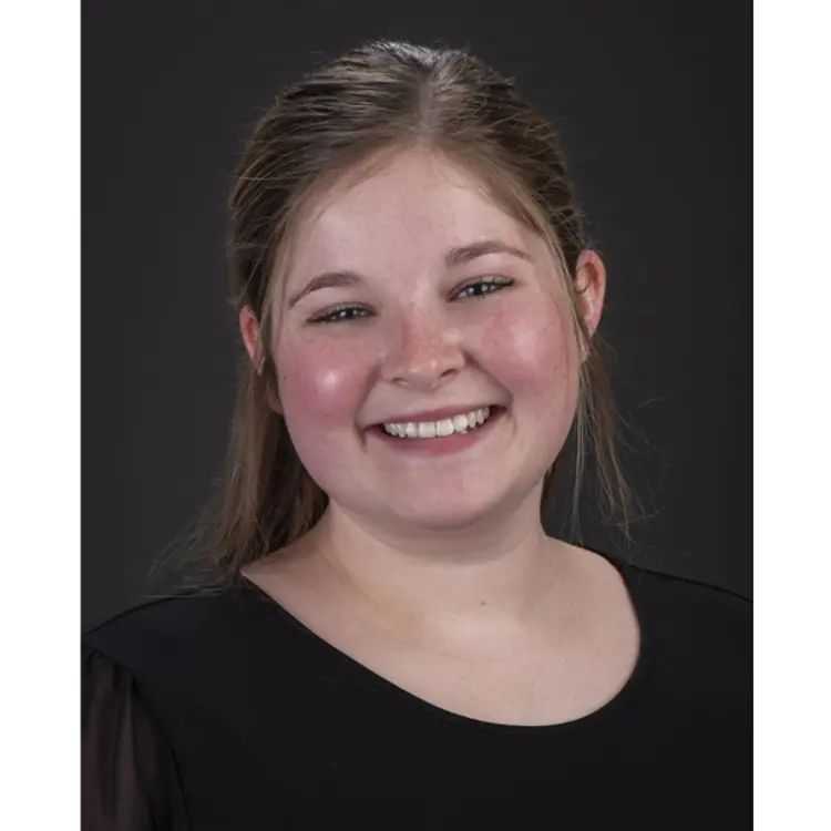 Professional portrait of USI management graduate Kennedy
