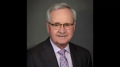 Board Trustee Ron Romain