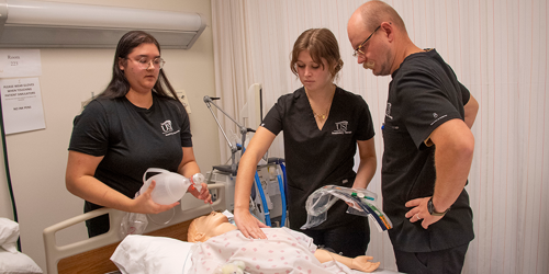students learning about intubation in the simulation center