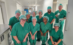 Healthcare students wearing green scrubs at hospital in Germany