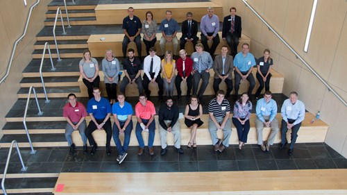 Group photo of all participants on the BEC atrium steps