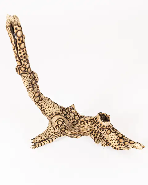 tattooed wood art piece