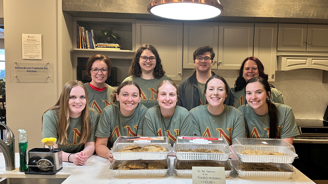 Students serving meal at the Ronald McDonald House