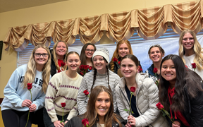 Students participating in roses for residents program