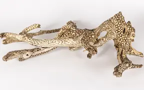 tattooed wood art piece