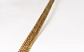 tattooed wood art piece