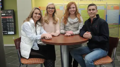 A Business Case Competition team poses for a photo. 