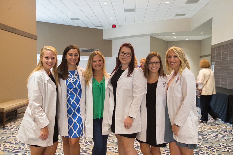 Students in white coats