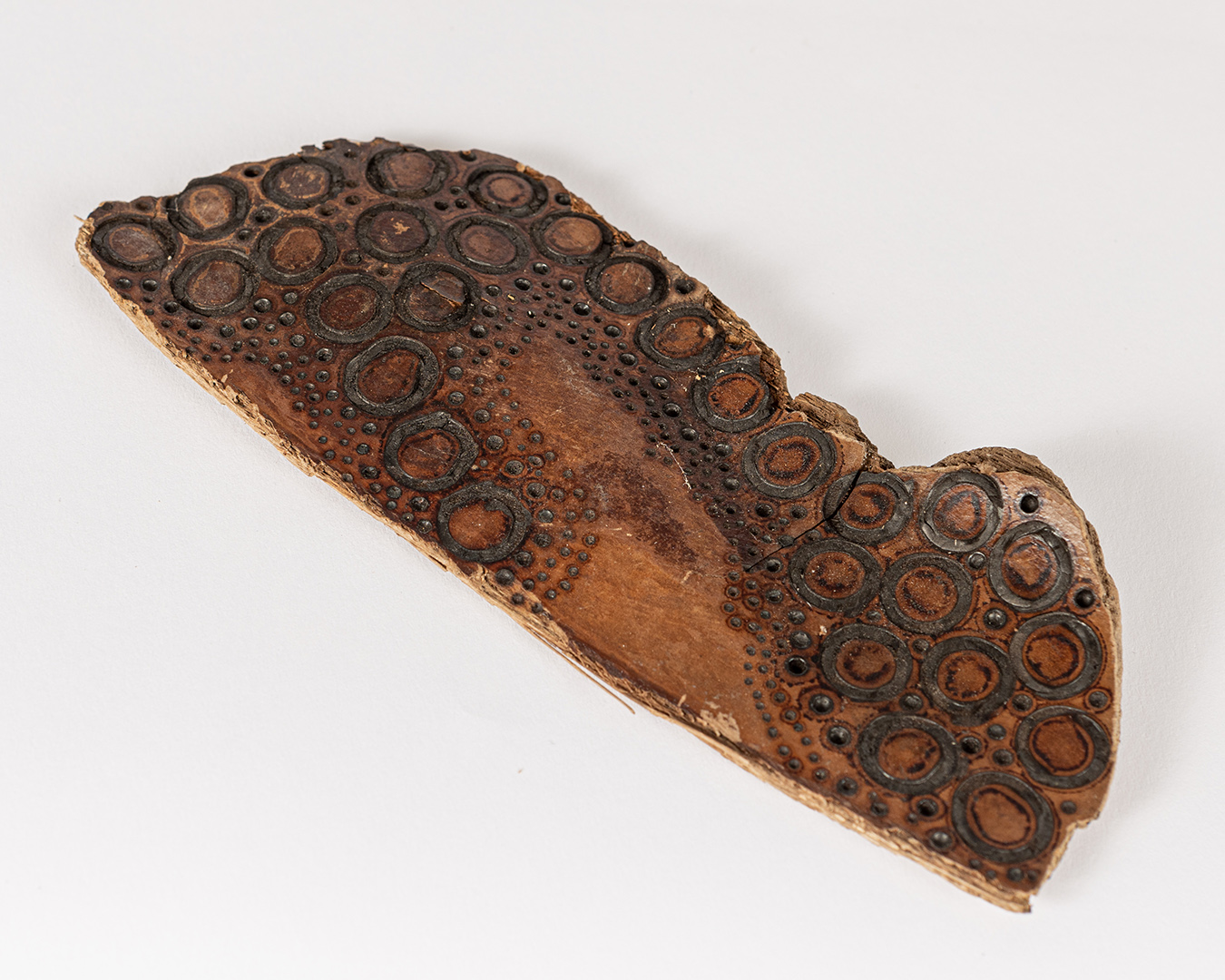 tattooed wood art piece