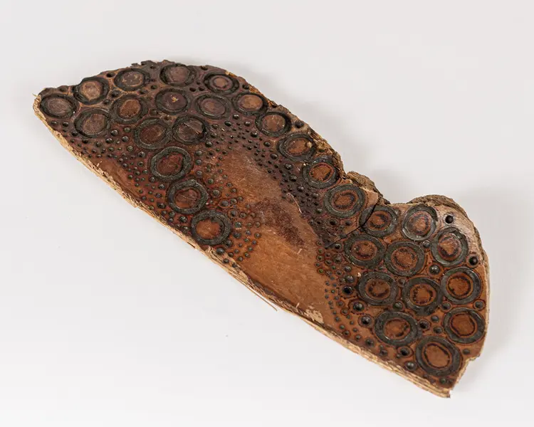 tattooed wood art piece