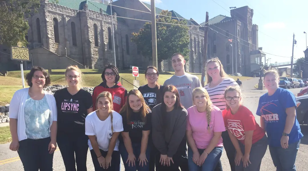 Criminal justice students and faculty pose outside the Kentucky State Penitentiary in Eddyville