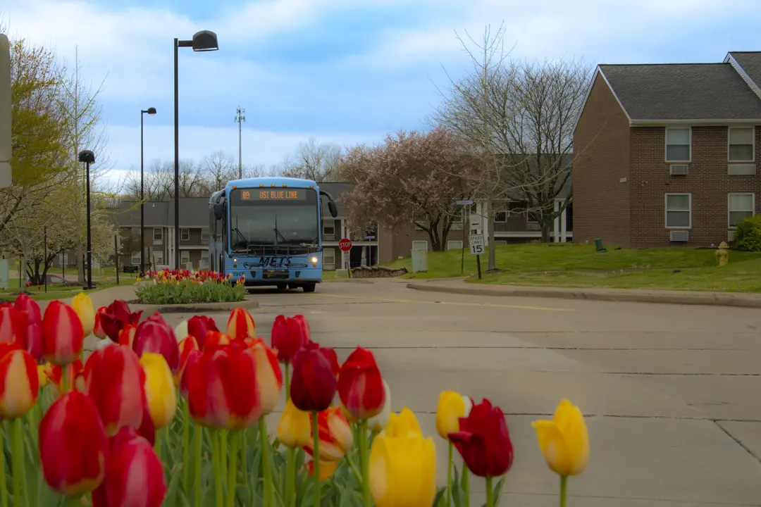 A USI bus by the student apartments