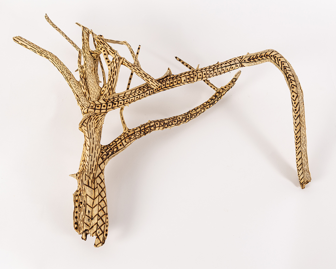 tattooed wood art piece