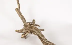 tattooed wood art piece