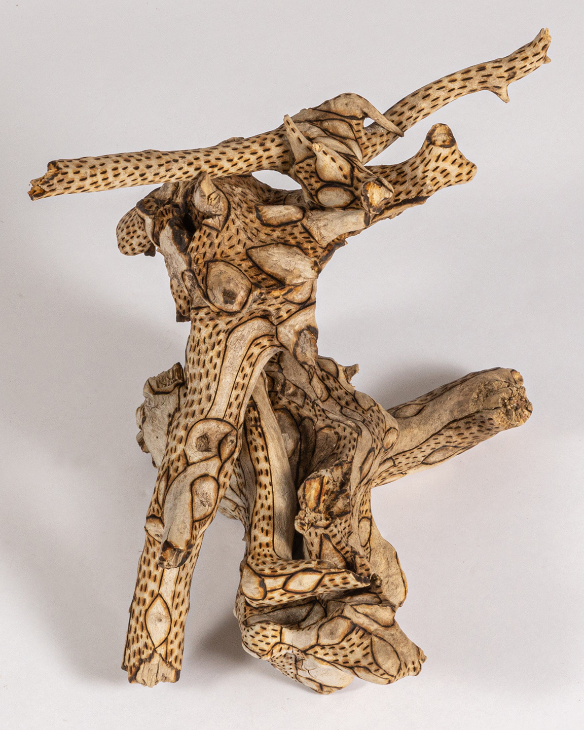 tattooed wood art piece
