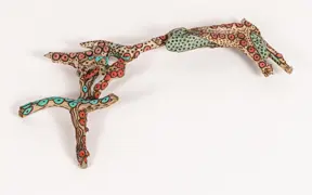 tattooed wood art piece
