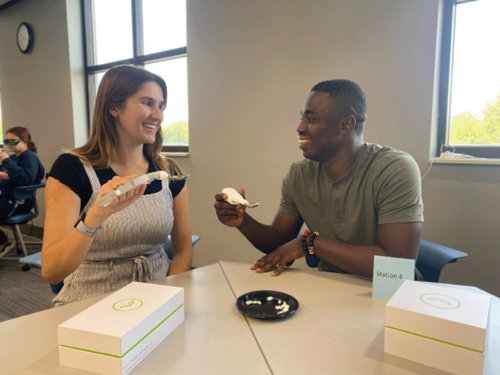 USI Community Nutrition class participants use geriatric simulation kits