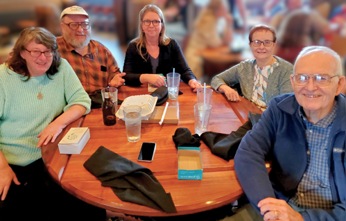 Center for Communal Studies board members seated around a table