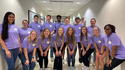 Pott College of Science, Engineering, and Education's Student Advisory Board members pose as a group in matching t-shirts