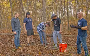 Students installing posts for the directional signage along trails at the 1st Trail Clean Up and Weed Wrangle. 