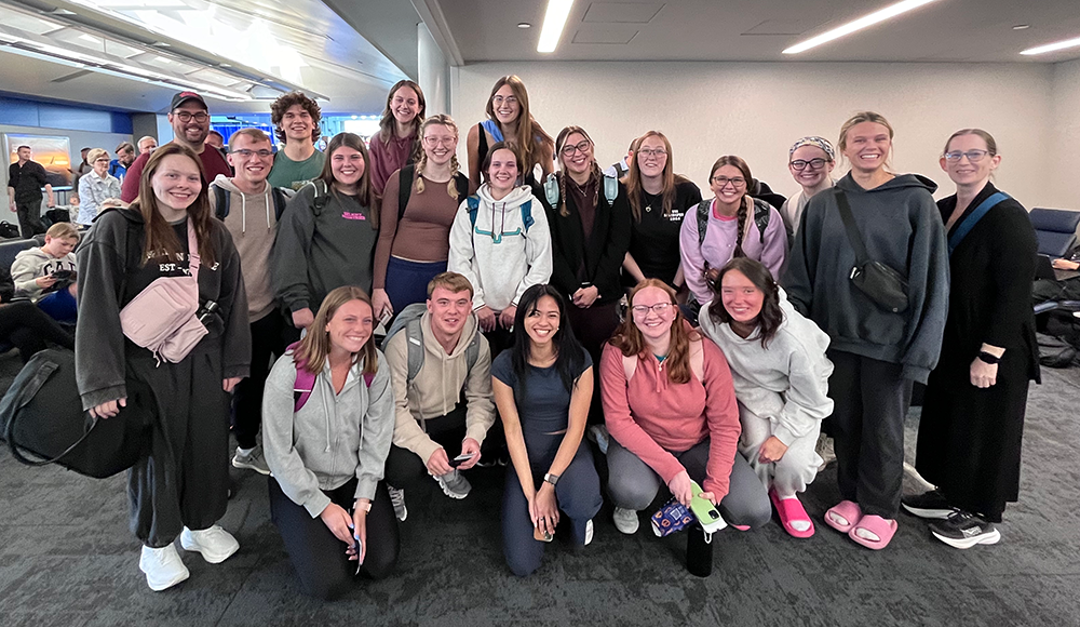 Students at airport on their way to Germany