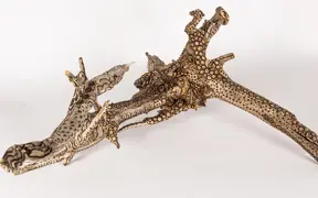 tattooed wood art piece