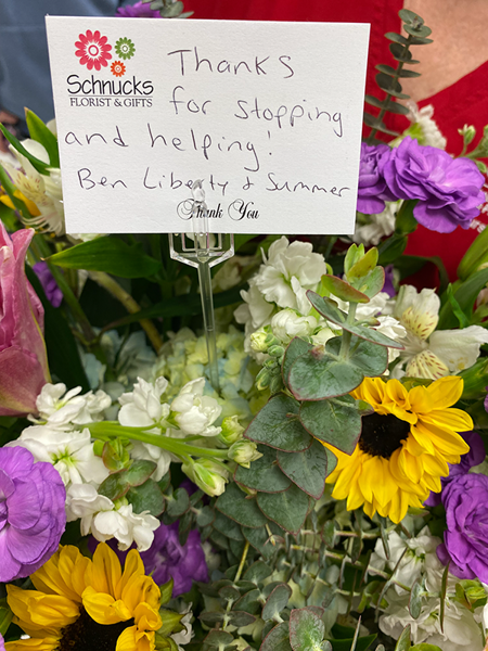 Photo of a bouquet of flowers and thank you card
