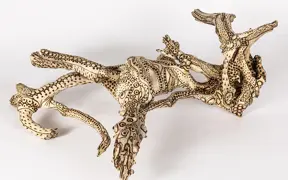 tattooed wood art piece