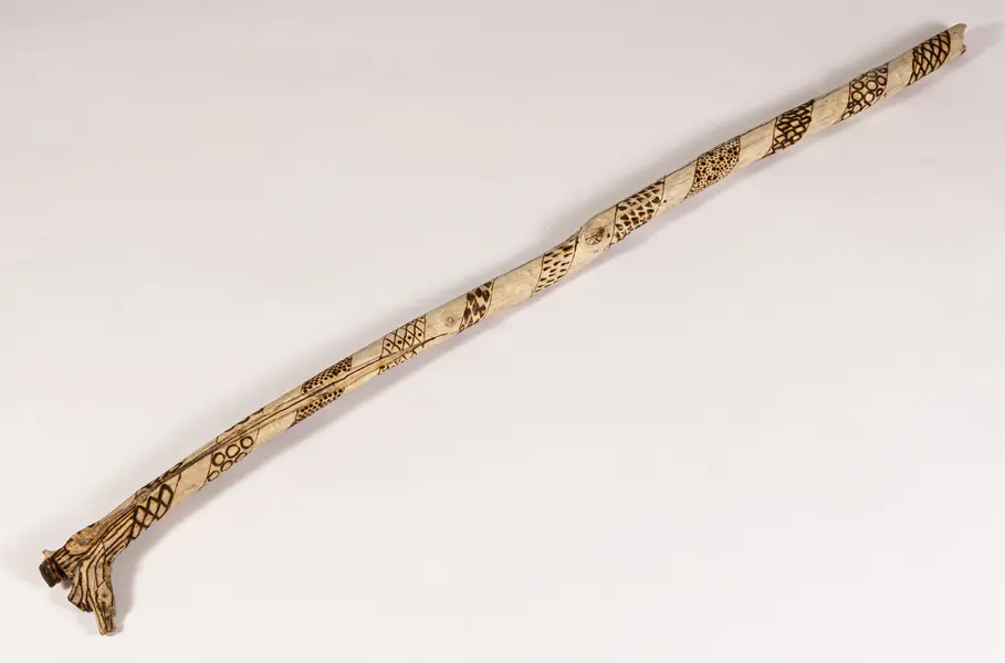 tattooed wood art piece