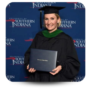ashley elpers in graduation cap and gown holding diploma