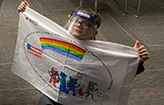 Photo of child holding a pillowcase