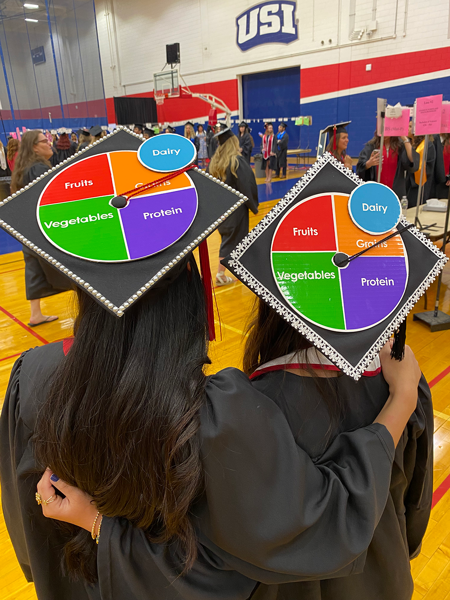 Decorated grad caps for food and nutrition students
