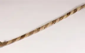 tattooed wood art piece