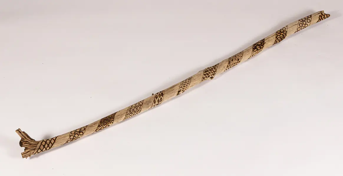 tattooed wood art piece